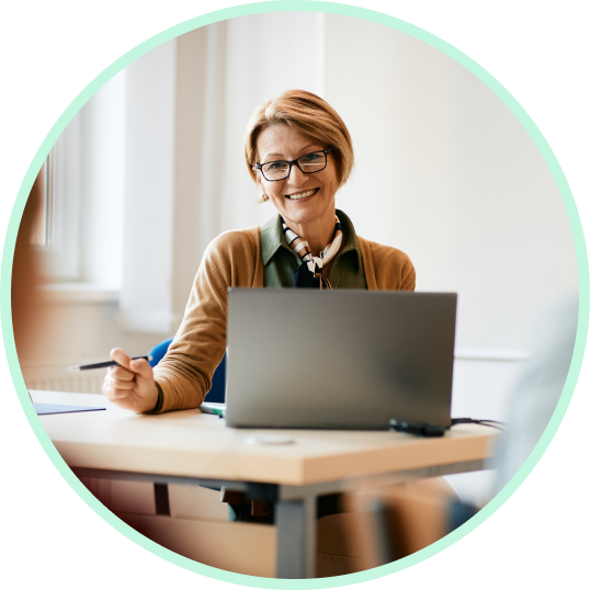 A lady telling a customer good places to buy computer parts