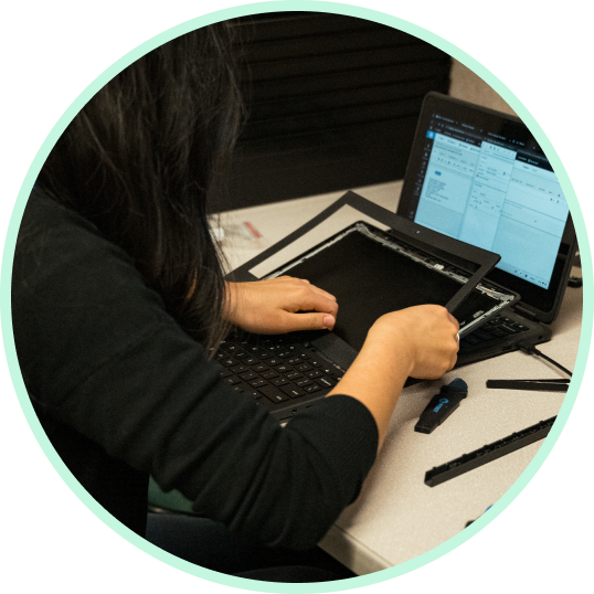 A technician using an Acer Chromebook Bezel sourced from Chromebook Tech.